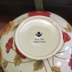 Decorative bowl with Red and Brown Floral Design