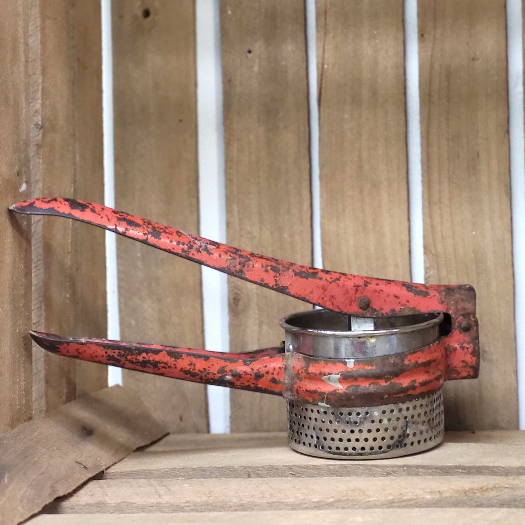 Vintage Ricer with Red Handle